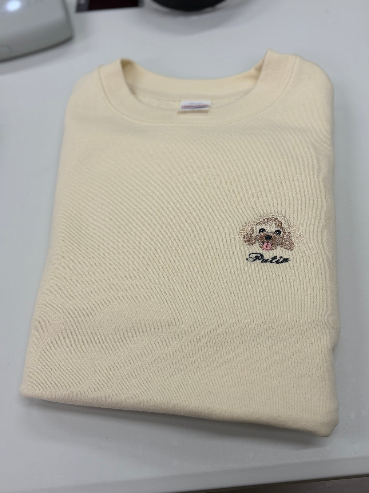 ワンポイント刺繍トレーナー たたみ